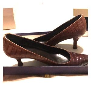 Brown faux alligator skin shoe.